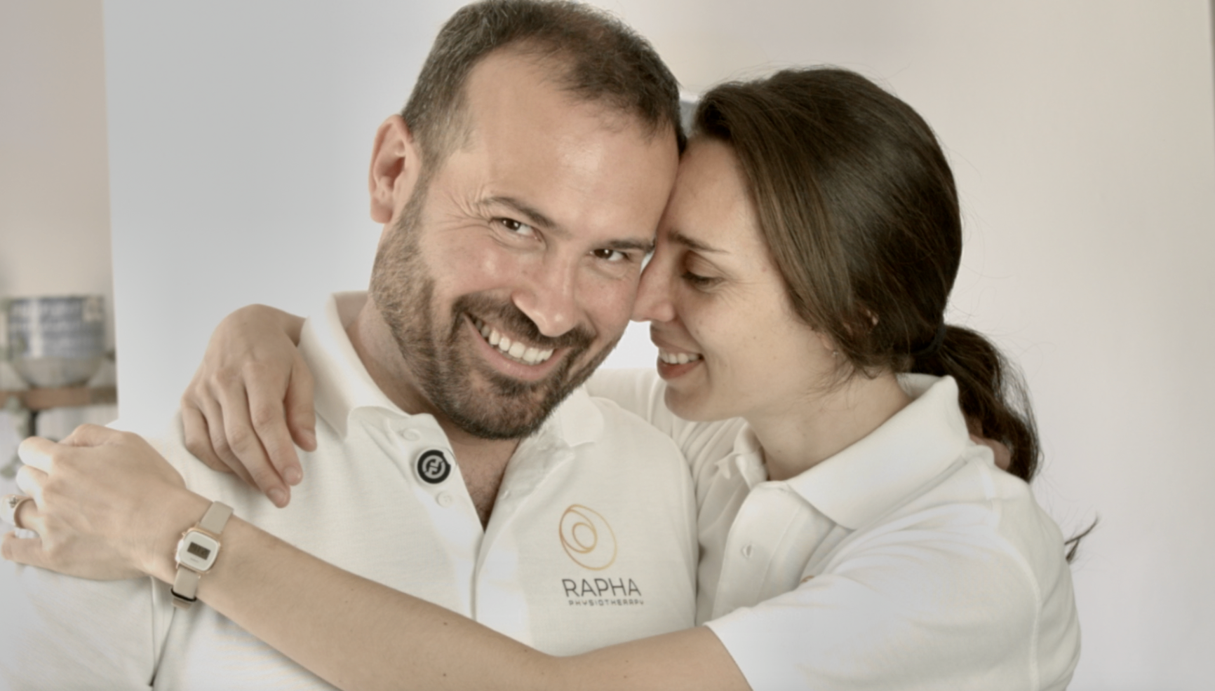 Older couple receiving home-visit physiotherapy care